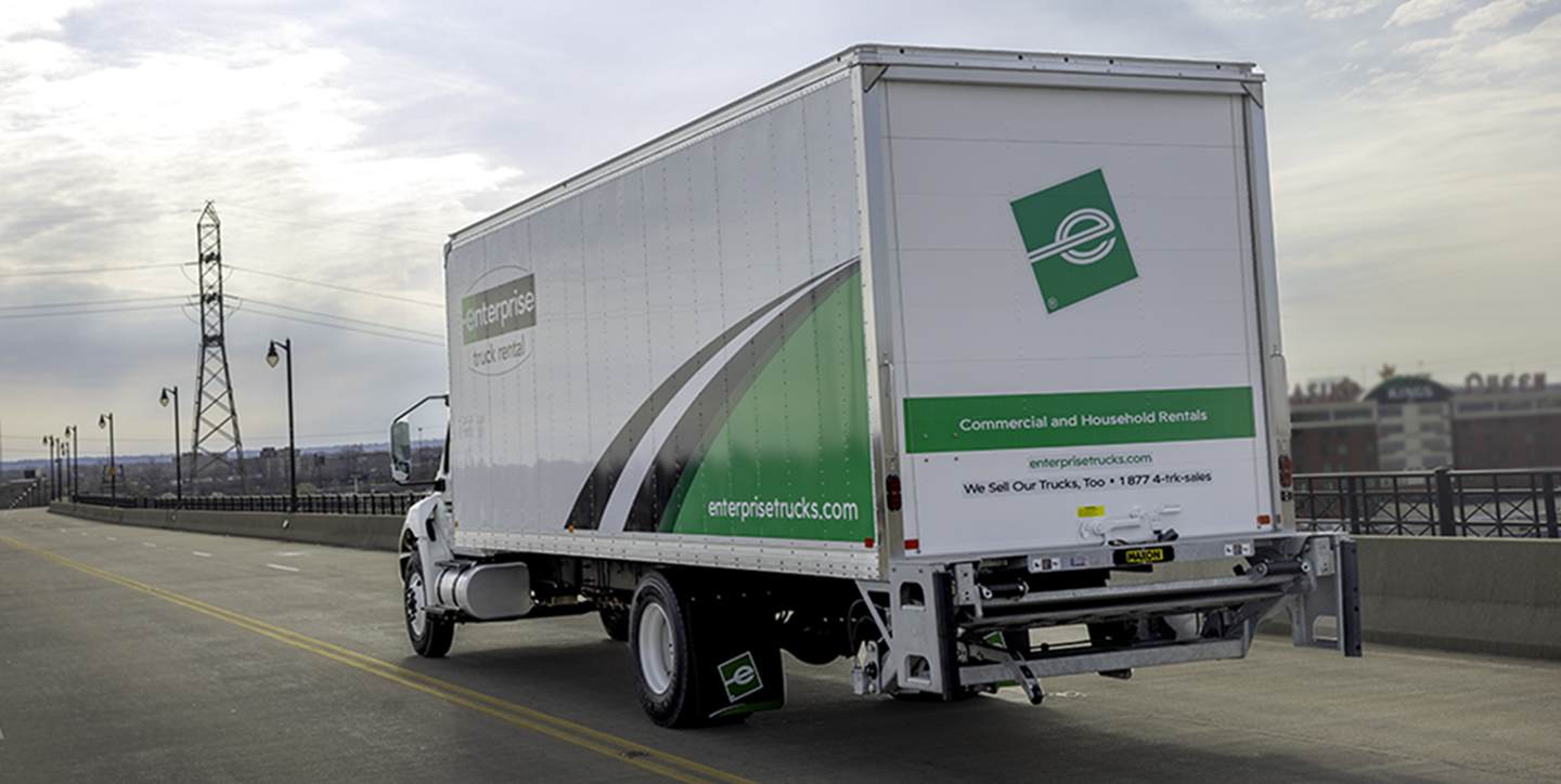 Employees loading an Enterprise Rental Truck